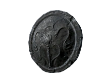 Круглый каменный щит