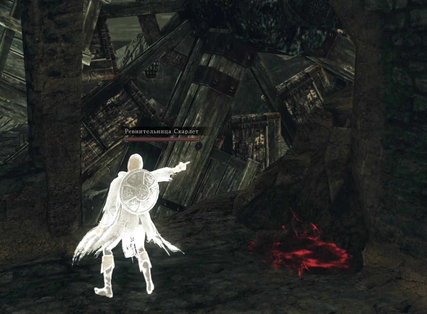 Указывает на мельницу.